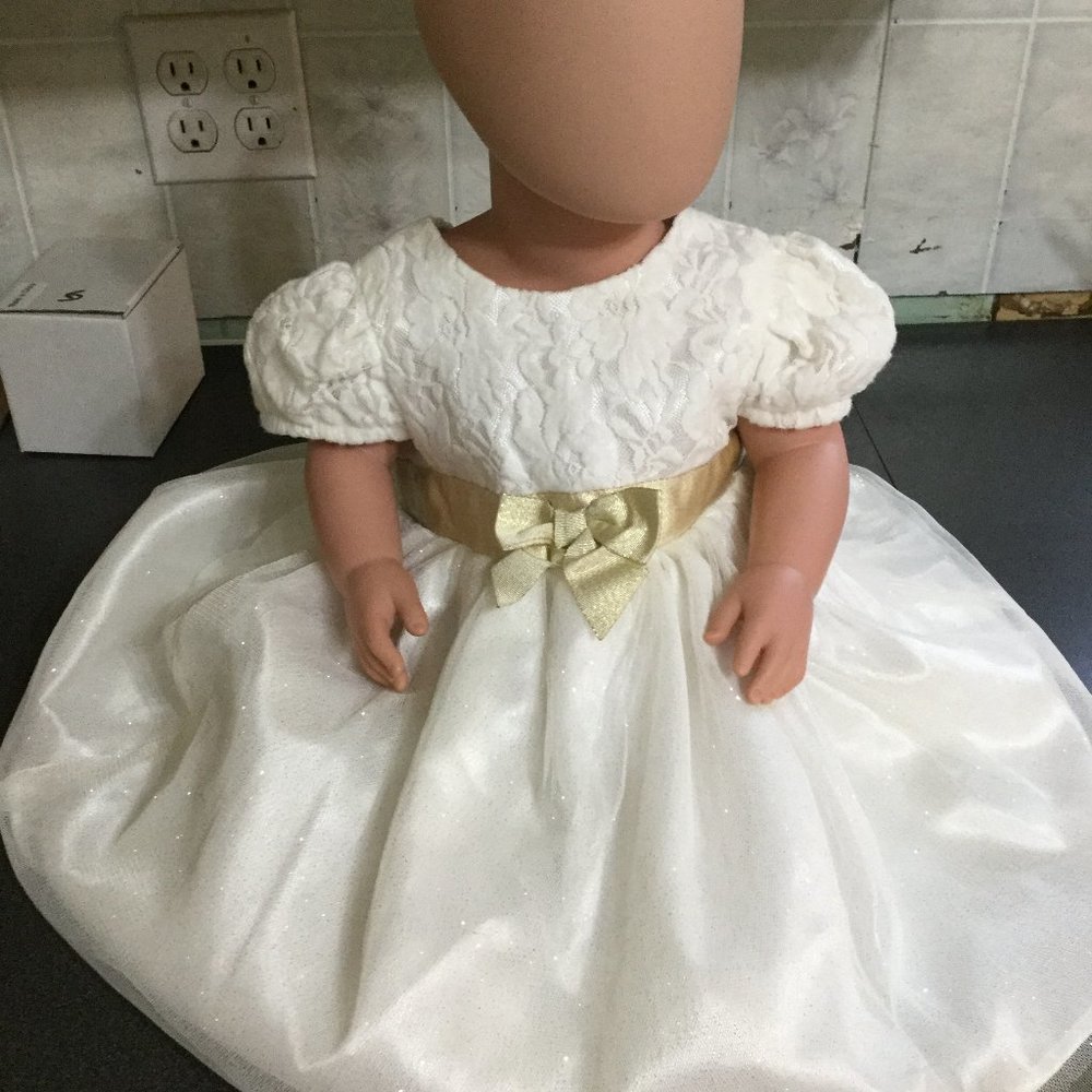 George Dress white with gold and sparkles and a gold bow size 12-18 months